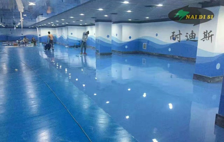 蘇寧易購地下車庫自流平彩砂工程